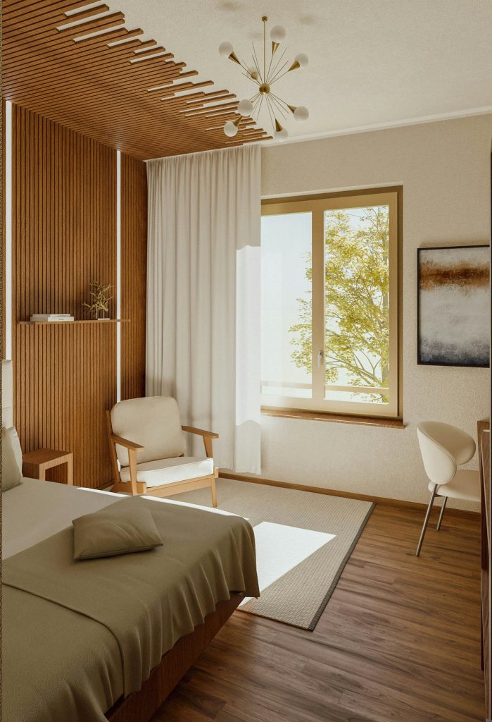 Habitación individual con escritorio y luz natural